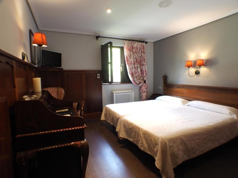 Hotel Комільяс Номер фото